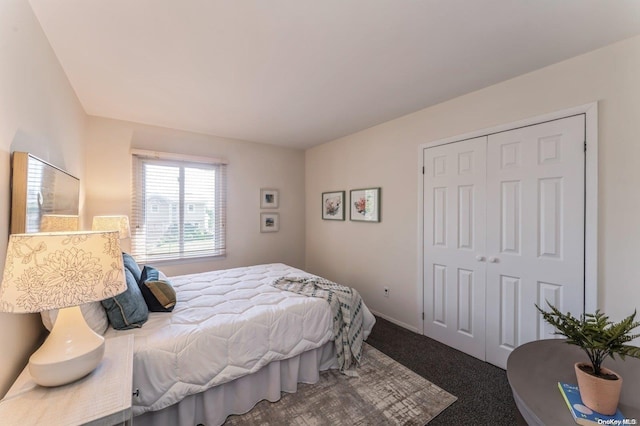 carpeted bedroom with a closet