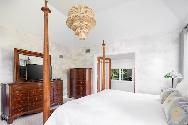 bedroom featuring lofted ceiling