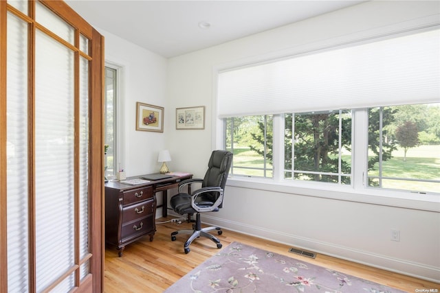 home office featuring light wood-type flooring