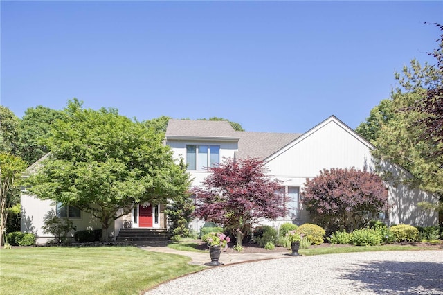 view of front of house with a front lawn