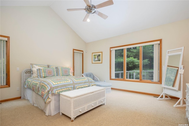 bedroom with carpet flooring, ceiling fan, and high vaulted ceiling