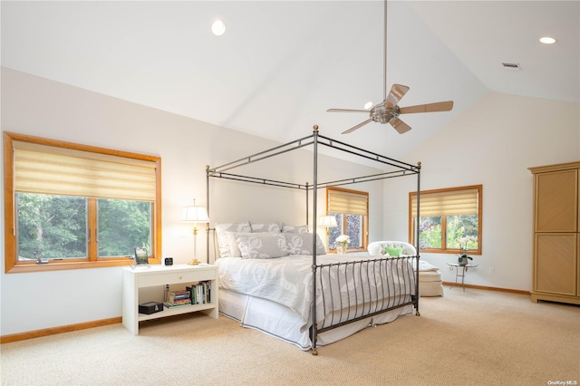 carpeted bedroom featuring ceiling fan, high vaulted ceiling, and multiple windows