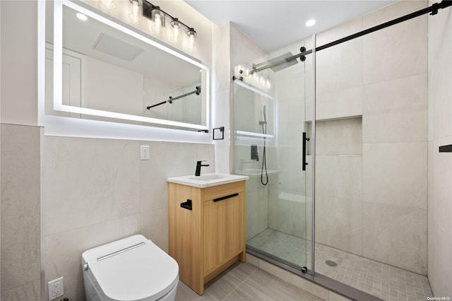 bathroom featuring vanity, tile walls, an enclosed shower, and toilet