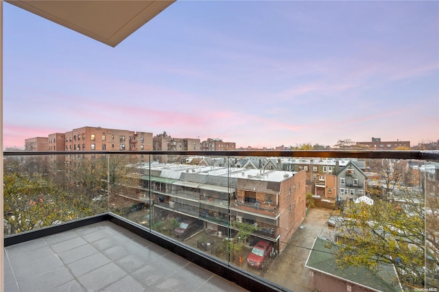 view of balcony at dusk