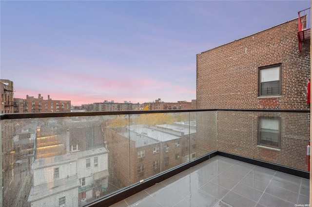 view of balcony at dusk