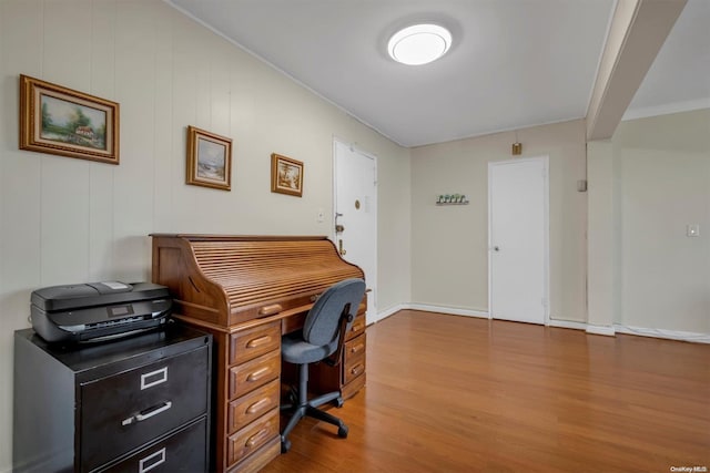 office area with crown molding and hardwood / wood-style floors