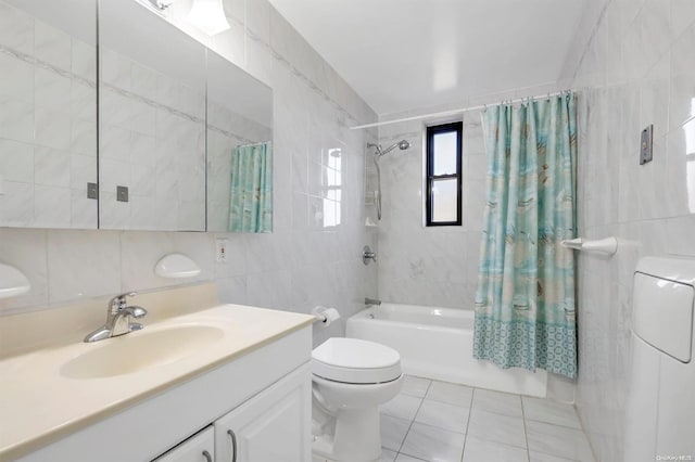 full bathroom featuring shower / bath combination with curtain, vanity, tile walls, tile patterned flooring, and washer / dryer