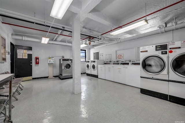 washroom featuring washer and dryer