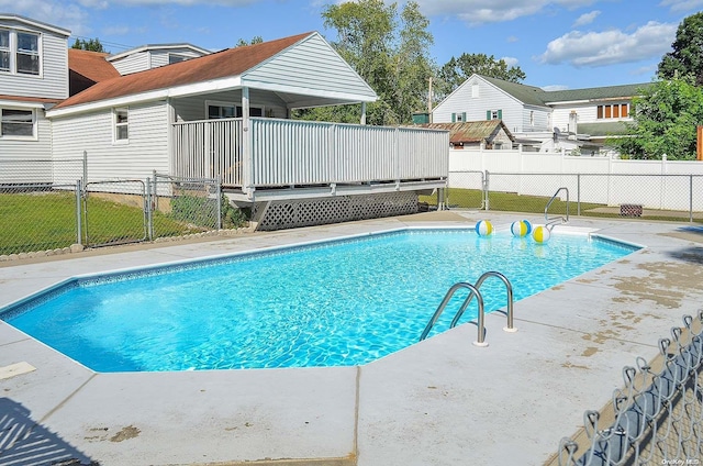 view of pool featuring a patio area