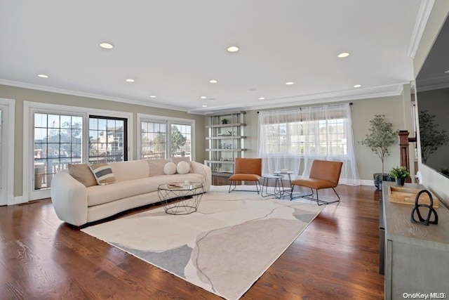 living room featuring dark hardwood / wood-style floors and ornamental molding