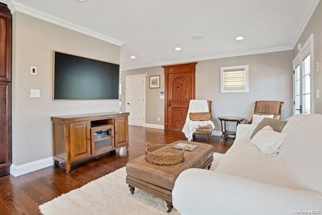 living room with dark wood-type flooring and ornamental molding