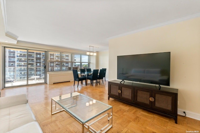 living room with light parquet flooring and ornamental molding