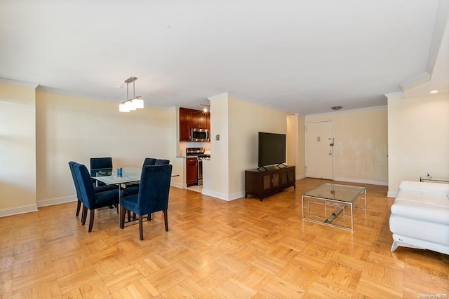 dining space with light parquet floors and ornamental molding