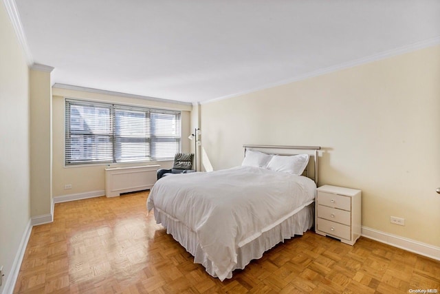 bedroom featuring ornamental molding and light parquet flooring