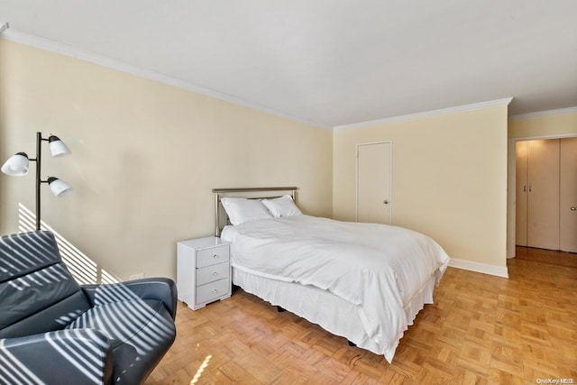 bedroom featuring ornamental molding and light parquet floors