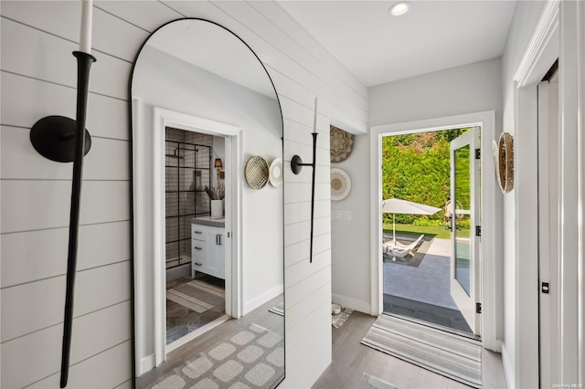 doorway with light hardwood / wood-style floors