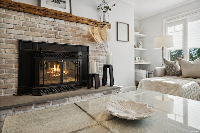 interior space with ornamental molding and a fireplace