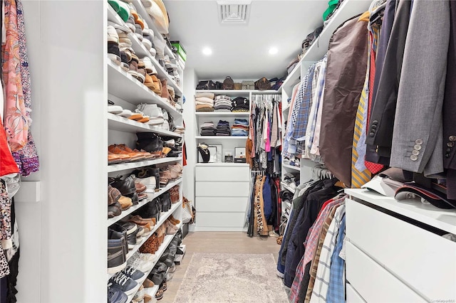 walk in closet featuring light wood-type flooring