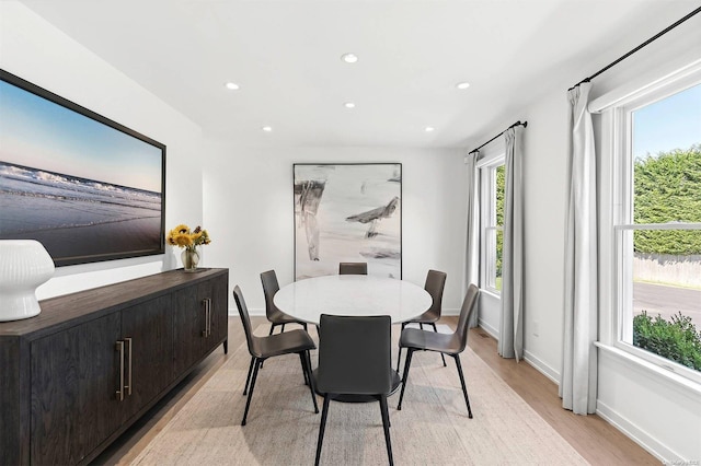 dining room featuring light hardwood / wood-style flooring