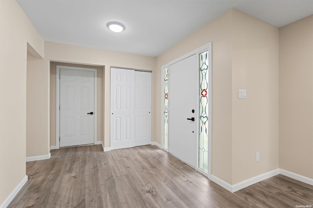 foyer featuring light wood-type flooring