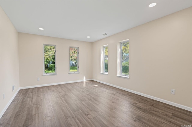 empty room featuring hardwood / wood-style floors