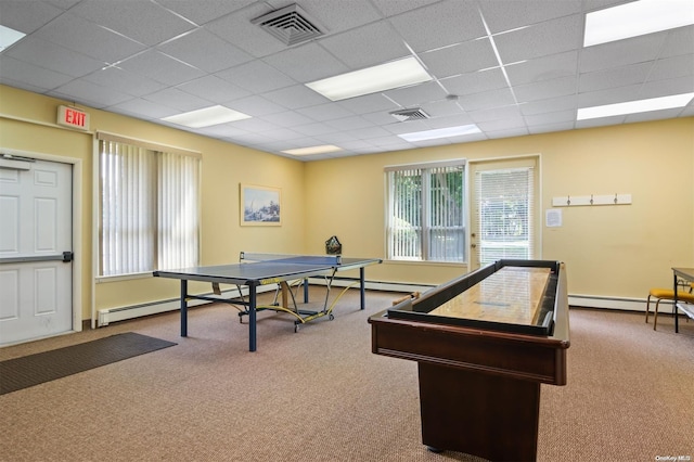 game room featuring carpet, baseboard heating, and a drop ceiling