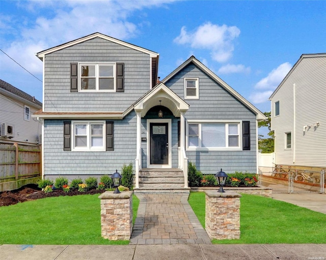 view of front of home with a front yard