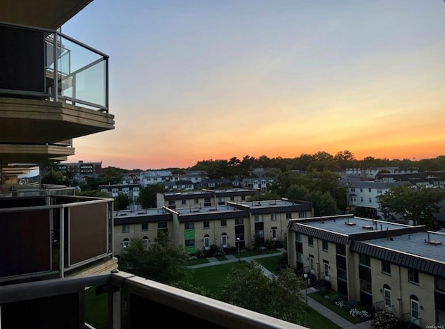 view of balcony at dusk