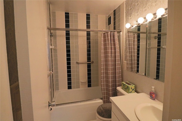 full bathroom featuring enclosed tub / shower combo, vanity, and toilet