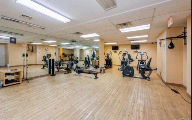 workout area featuring hardwood / wood-style floors