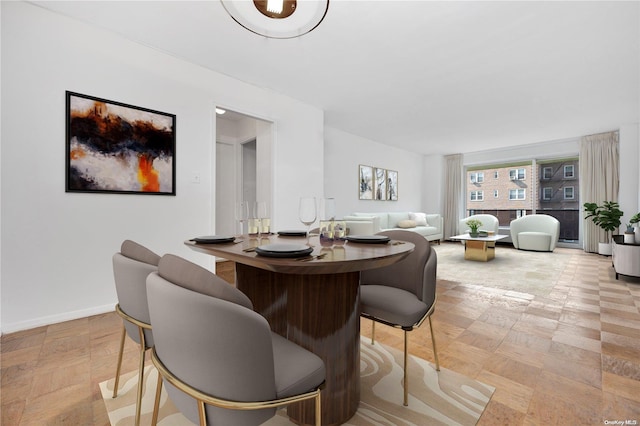 110-11 Queens Blvd Unit F4, Forest Hills, NY 11375 - dining room featuring baseboards