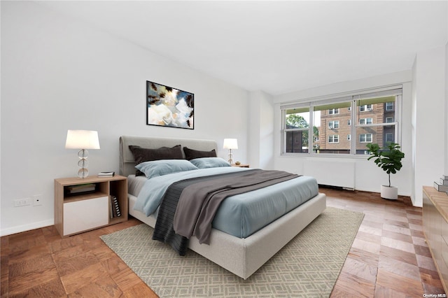 110-11 Queens Blvd Unit F4, Forest Hills, NY 11375 - bedroom featuring baseboards and radiator heating unit