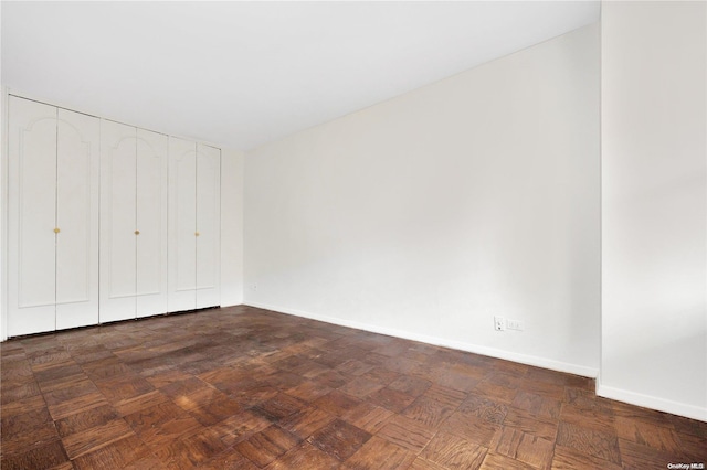 110-11 Queens Blvd Unit F4, Forest Hills, NY 11375 - unfurnished bedroom with baseboards and a closet