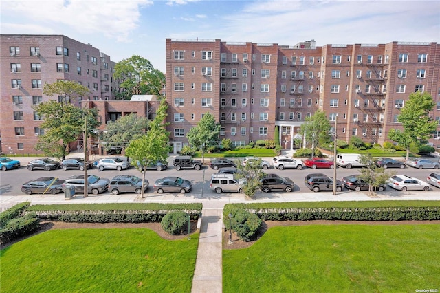 110-11 Queens Blvd Unit F4, Forest Hills, NY 11375 - view of apartment building / complex featuring uncovered parking
