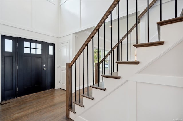 80 Ocean Ave, Massapequa, NY 11758 - foyer with stairway, a high ceiling, wood finished floors, and visible vents