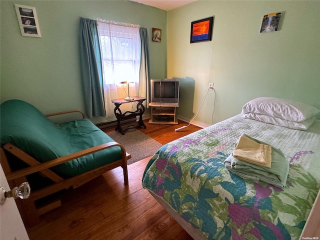 bedroom with wood-type flooring