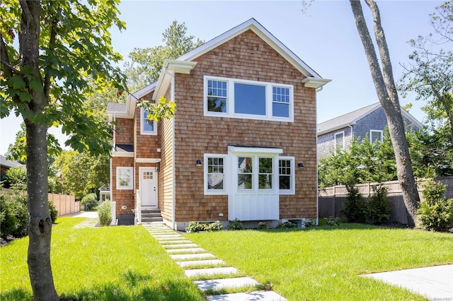 view of front of home with a front yard