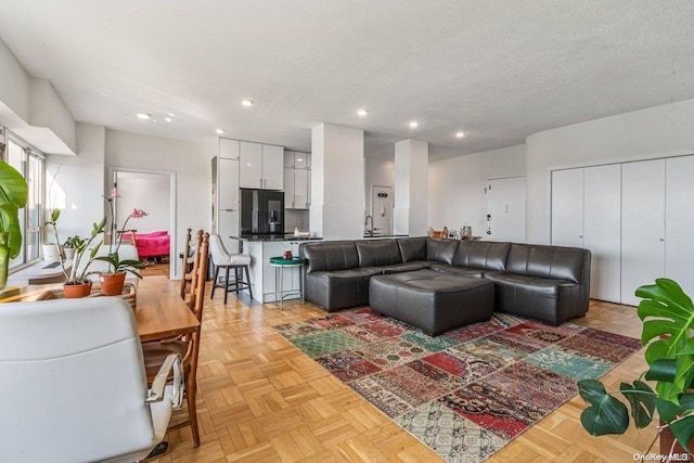 166-25 Powells Cove Blvd Unit 21G, Beechhurst, NY 11357 - living area featuring recessed lighting and a textured ceiling