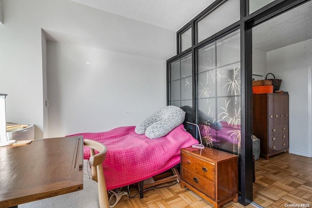 166-25 Powells Cove Blvd Unit 21G, Beechhurst, NY 11357 - bedroom featuring a textured ceiling