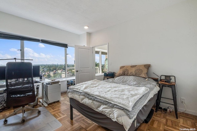 166-25 Powells Cove Blvd Unit 21G, Beechhurst, NY 11357 - bedroom featuring an office area, recessed lighting, and baseboards