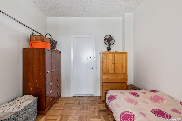 166-25 Powells Cove Blvd Unit 21G, Beechhurst, NY 11357 - bedroom with a textured ceiling