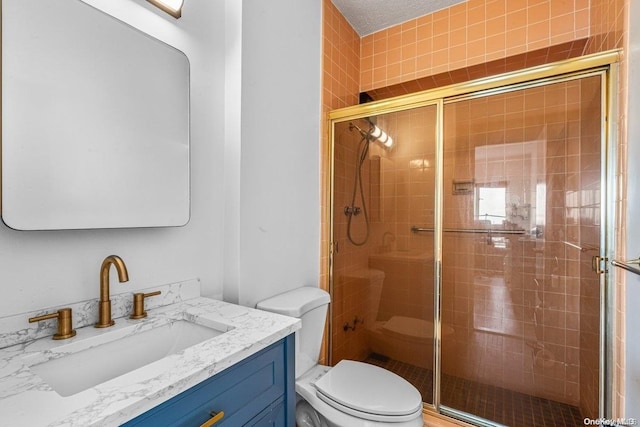166-25 Powells Cove Blvd Unit 21G, Beechhurst, NY 11357 - bathroom featuring toilet, vanity, and a shower stall