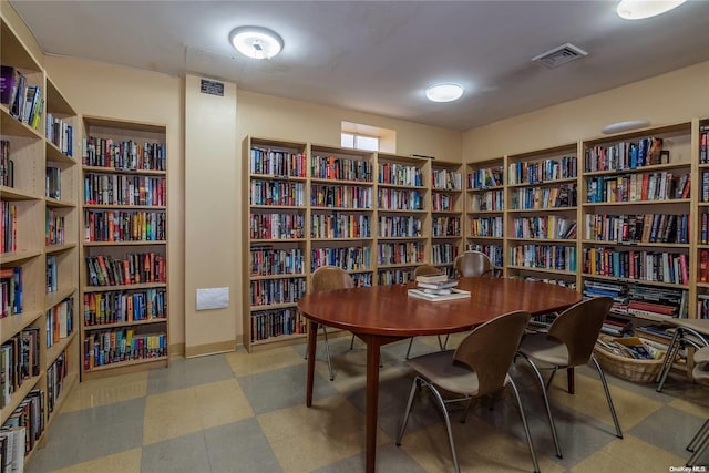 166-25 Powells Cove Blvd Unit 21G, Beechhurst, NY 11357 - office with bookshelves and tile patterned floors