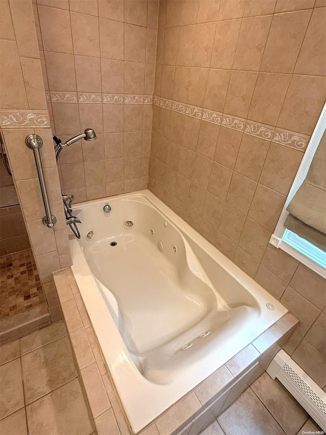 bathroom featuring plus walk in shower and tile patterned floors