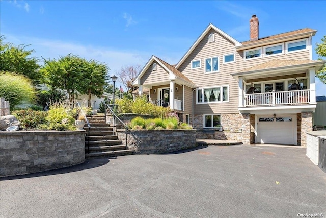 view of front of property with a garage