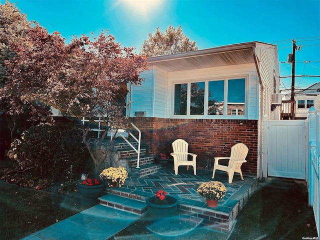 rear view of property with a patio area