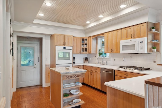 156 Ram Island Dr, Shelter Island, NY 11964 - kitchen featuring open shelves, appliances with stainless steel finishes, light countertops, light wood-style floors, and crown molding