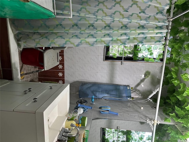 interior space with washer / clothes dryer