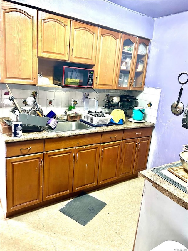 kitchen with tasteful backsplash