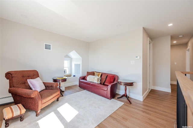 living room featuring light hardwood / wood-style floors